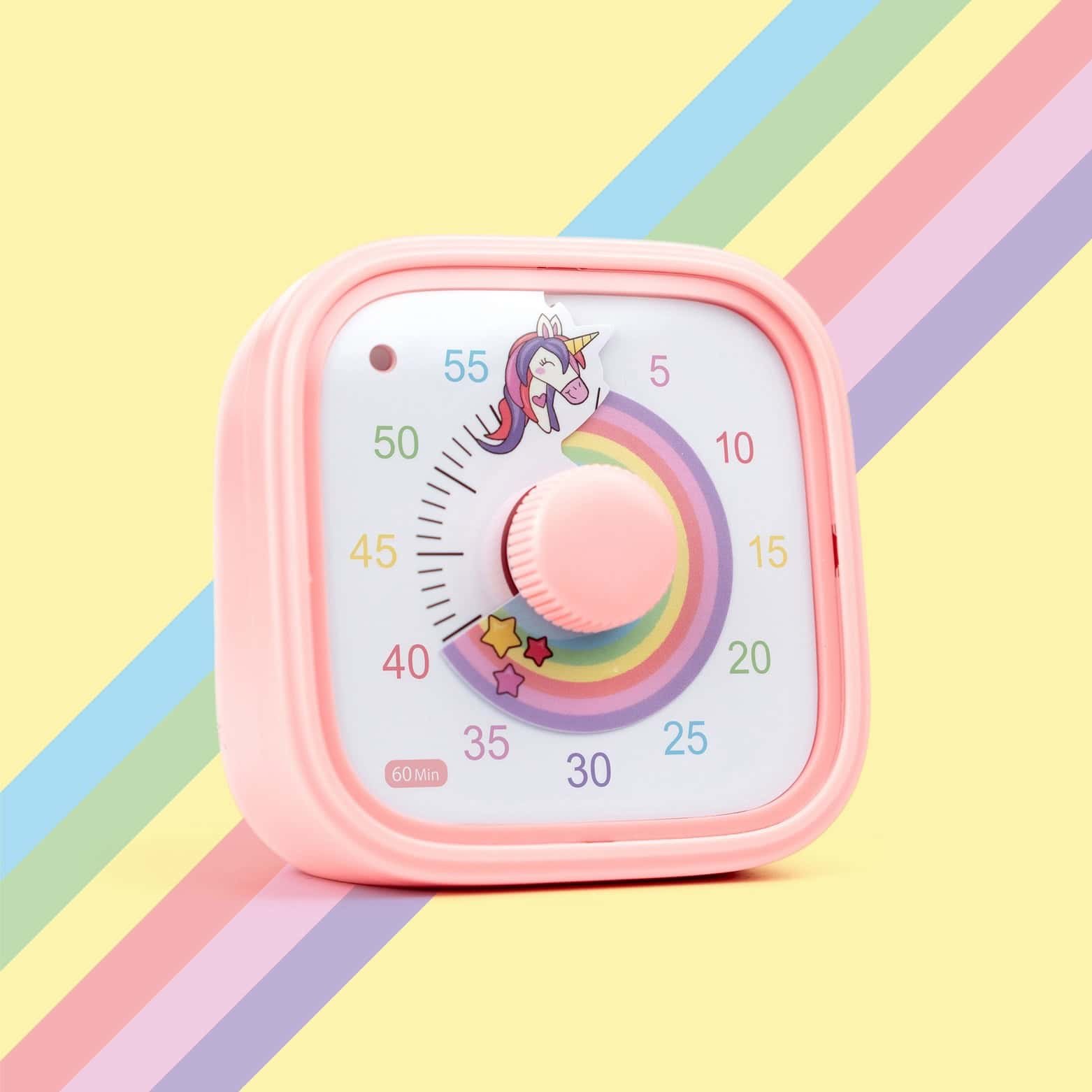 Pink unicorn-themed visual timer set to 35 minutes, displayed against a pastel yellow background with diagonal rainbow stripes. The timer features a smiling unicorn, a rainbow countdown disk, and colorful numbers from 0 to 60.